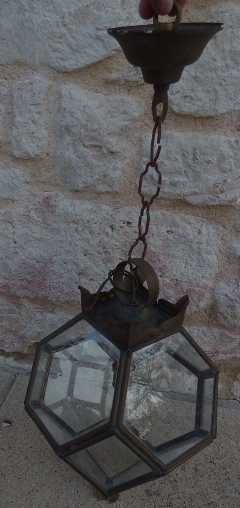 Old lantern in brass and glass with 8 facets or 24 stained glass windows