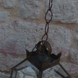 Old lantern in brass and glass with 8 facets or 24 stained glass windows