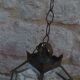 Old lantern in brass and glass with 8 facets or 24 stained glass windows