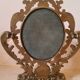 Baroque oval mirror pivoting on foot Golden brass 20x15cm