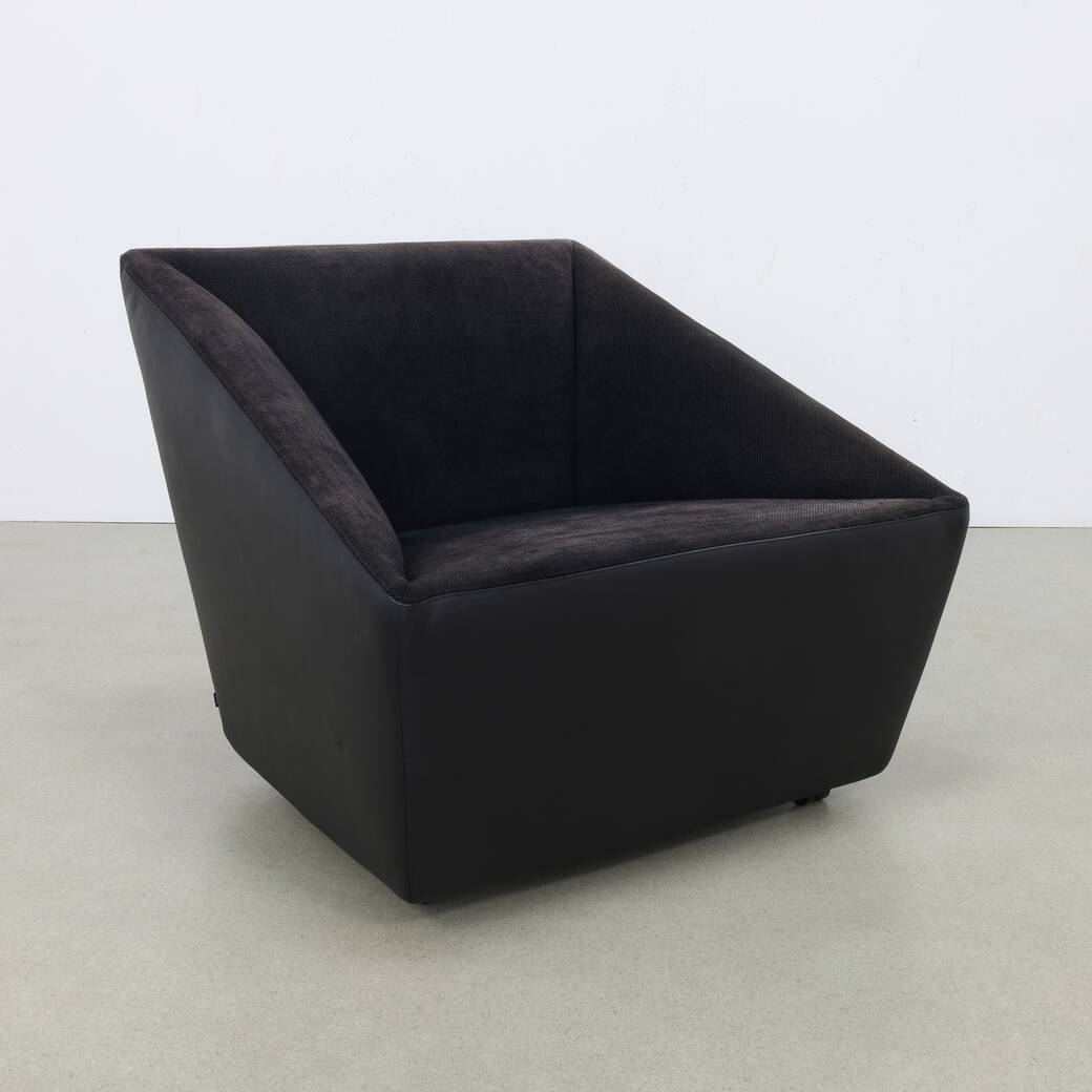 Postmodern Lounge Chair in Leather on wheels by COR