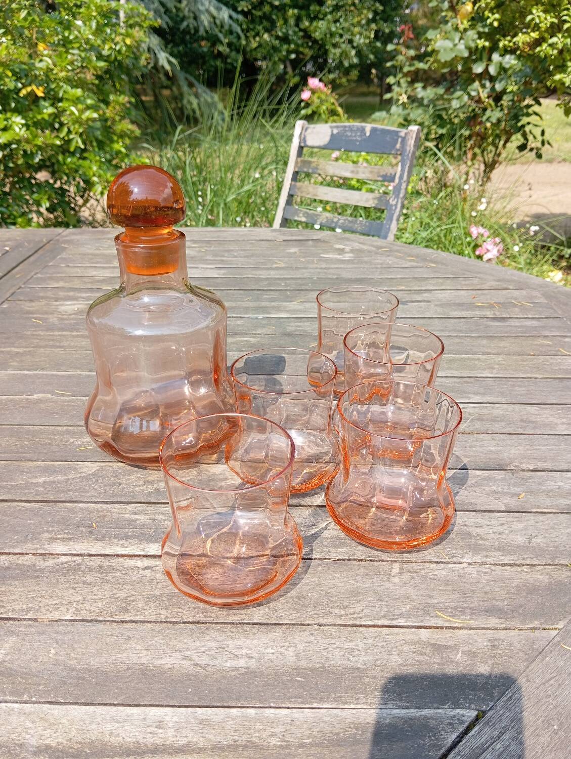 Retro whiskey set with pink glass, decanter and 5 glasses