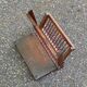 Vintage magazine rack, foldable wooden document holder.