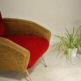 Red and mustard yellow fabric armchair in 1970s style