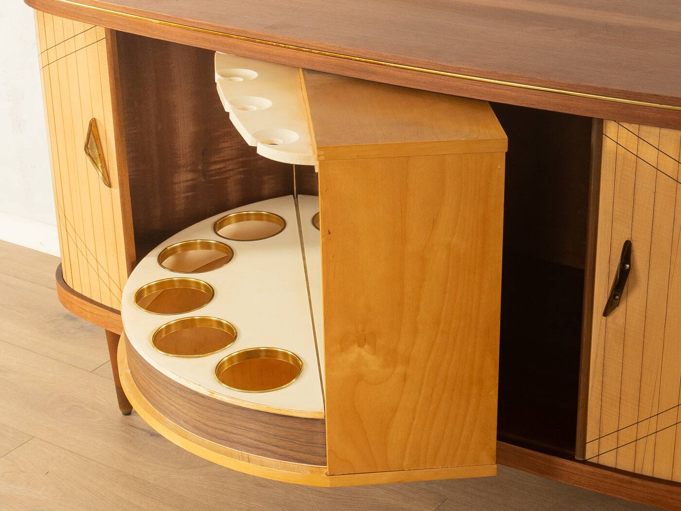 Elegant bar cabinet from the 1950s with rotating compartment and mirrored back