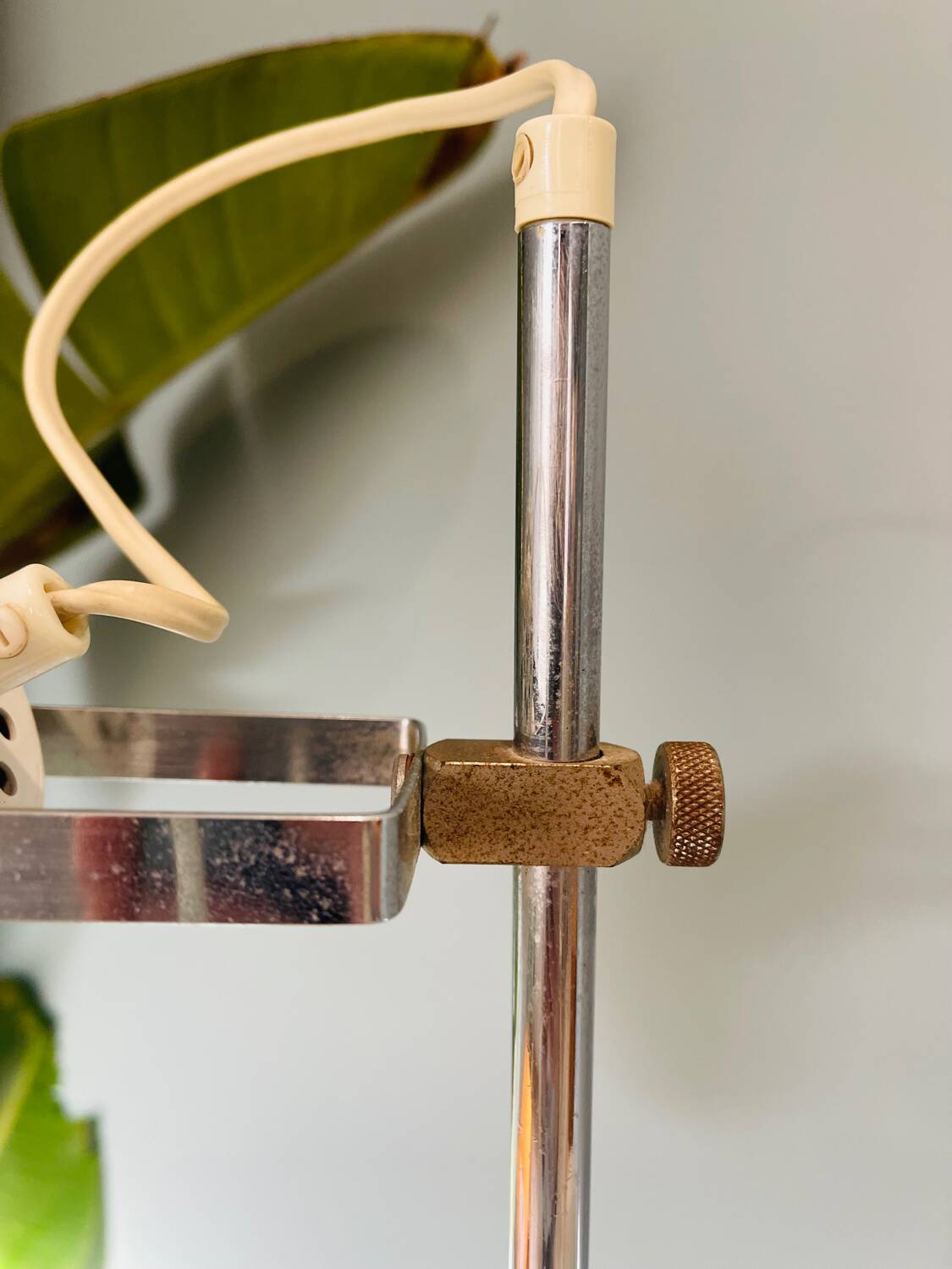 Chrome and white metal floor lamp, circa 1970.