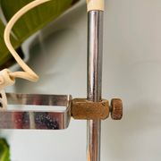 Chrome and white metal floor lamp, circa 1970.
