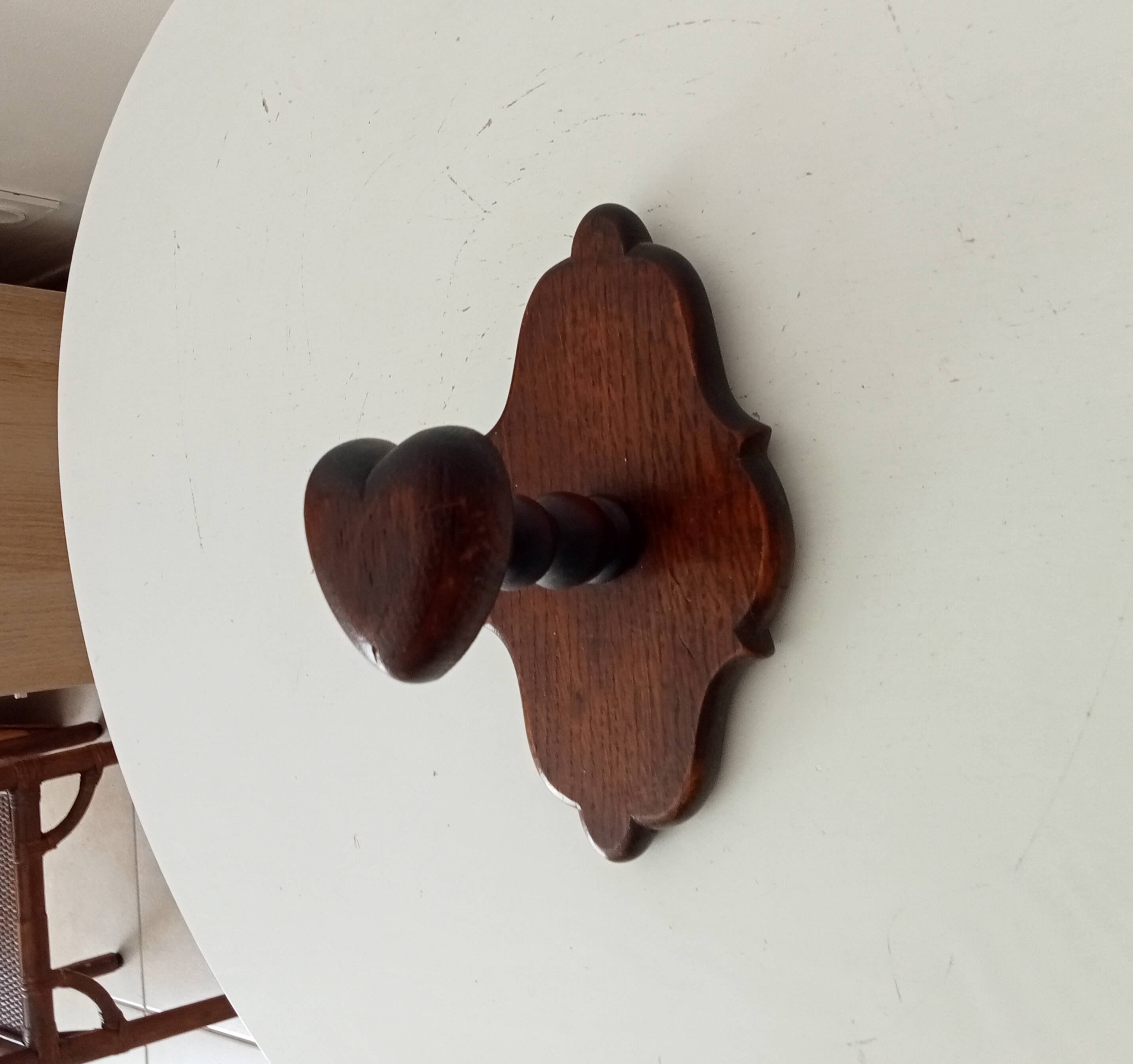 Vintage wall coat rack in carved solid wood, popular art.