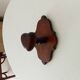 Vintage wall coat rack in carved solid wood, popular art.