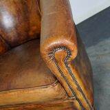 Vintage club armchair in leather color cognac Netherlands
