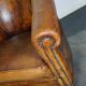 Vintage club armchair in leather color cognac Netherlands