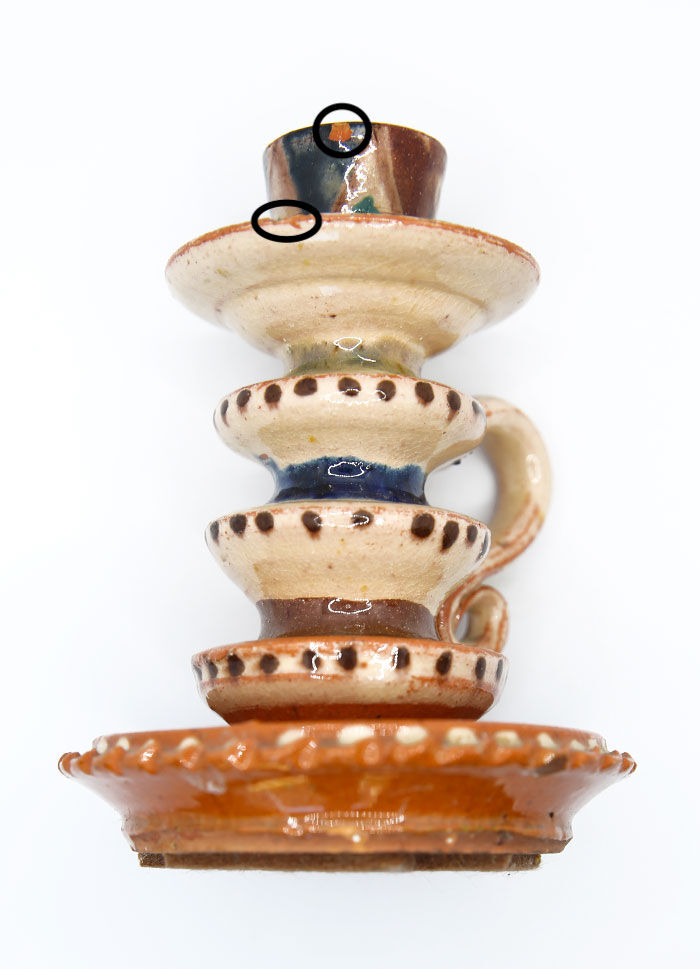 Ancient candlestick of Chmielno pottery, Poland