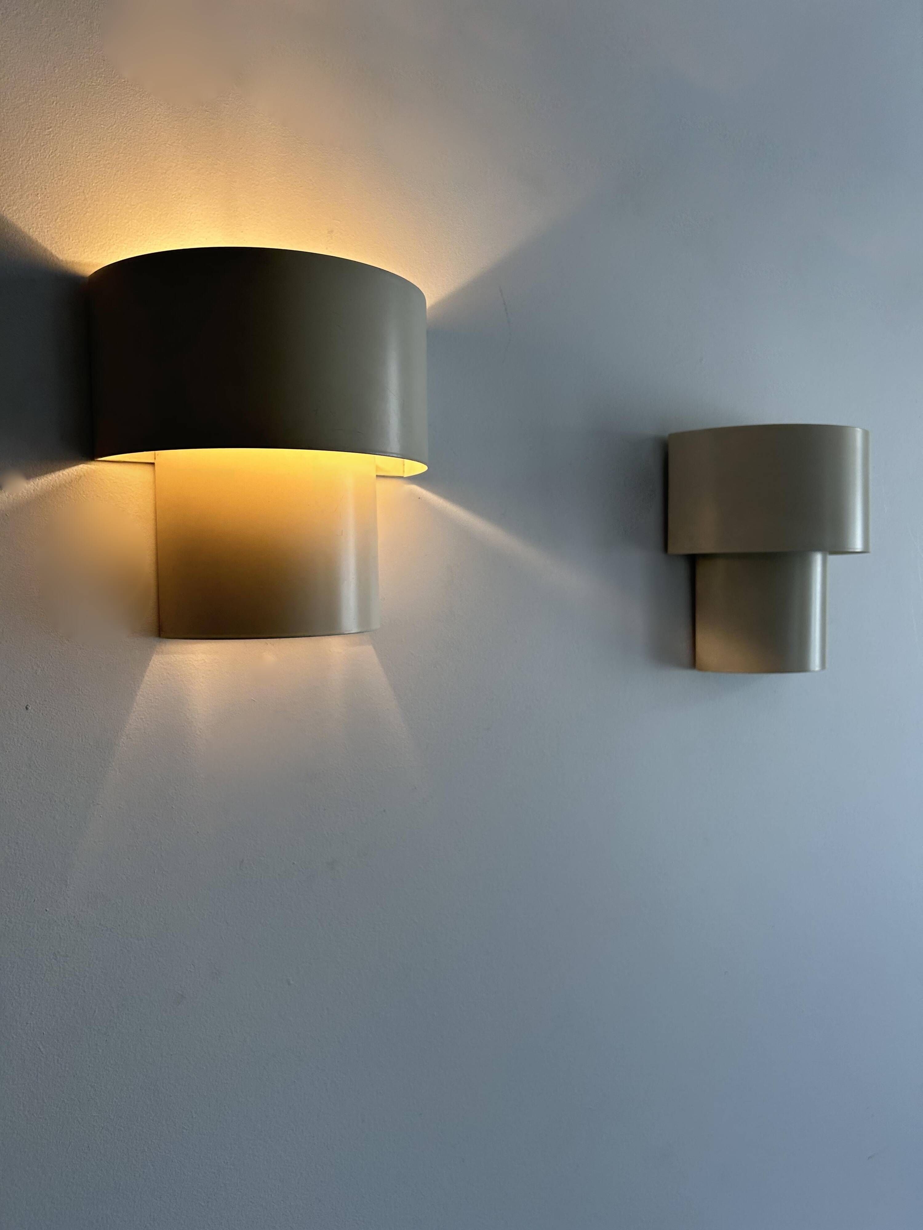Pair of vintage modernist wall lights, white lacquered metal, Sweden 1970