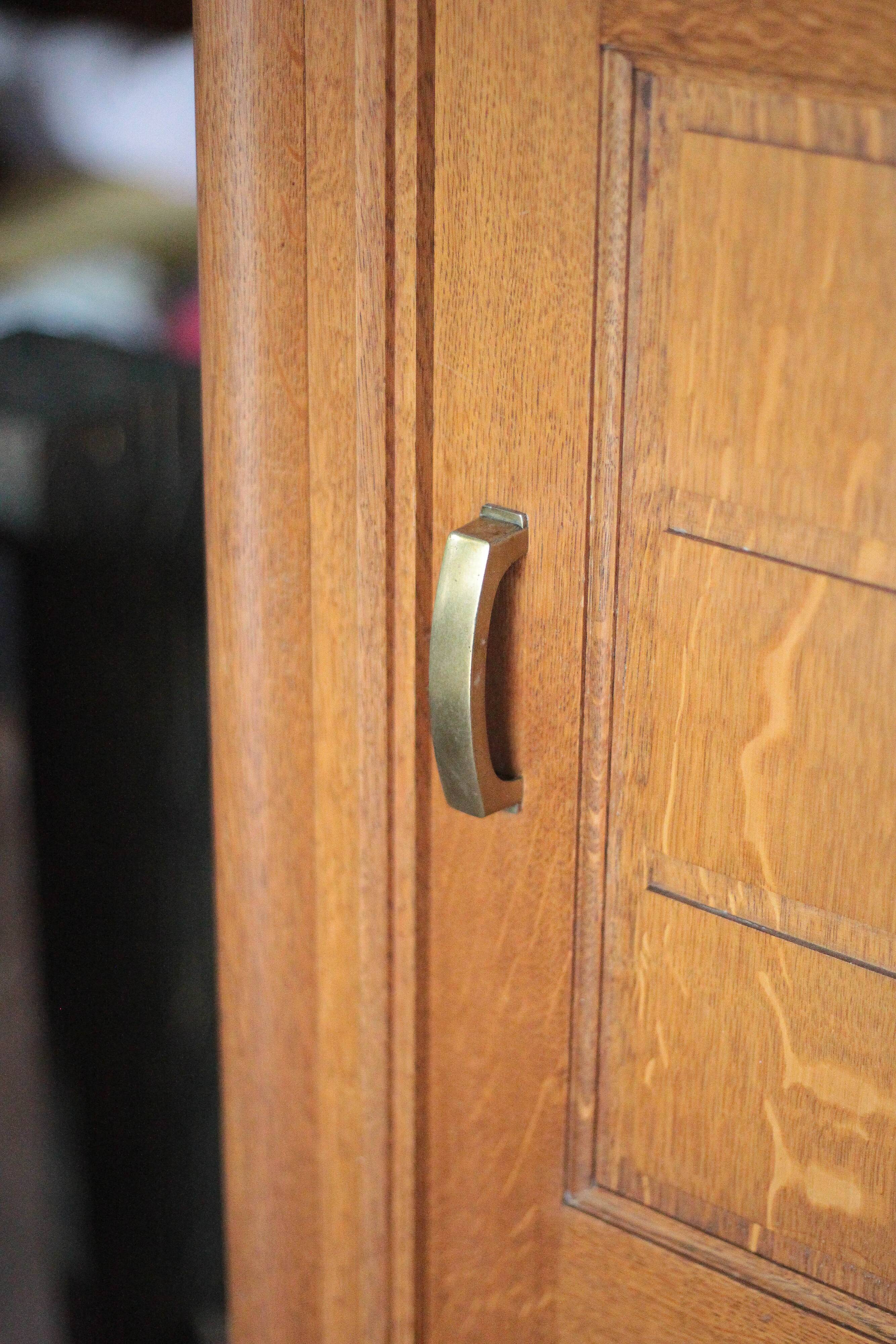 Vintage wooden wardrobe with sliding doors.