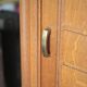 Vintage wooden wardrobe with sliding doors