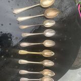 Set of 9 mismatched small spoons in silver metal, 7 small and two medium, art deco