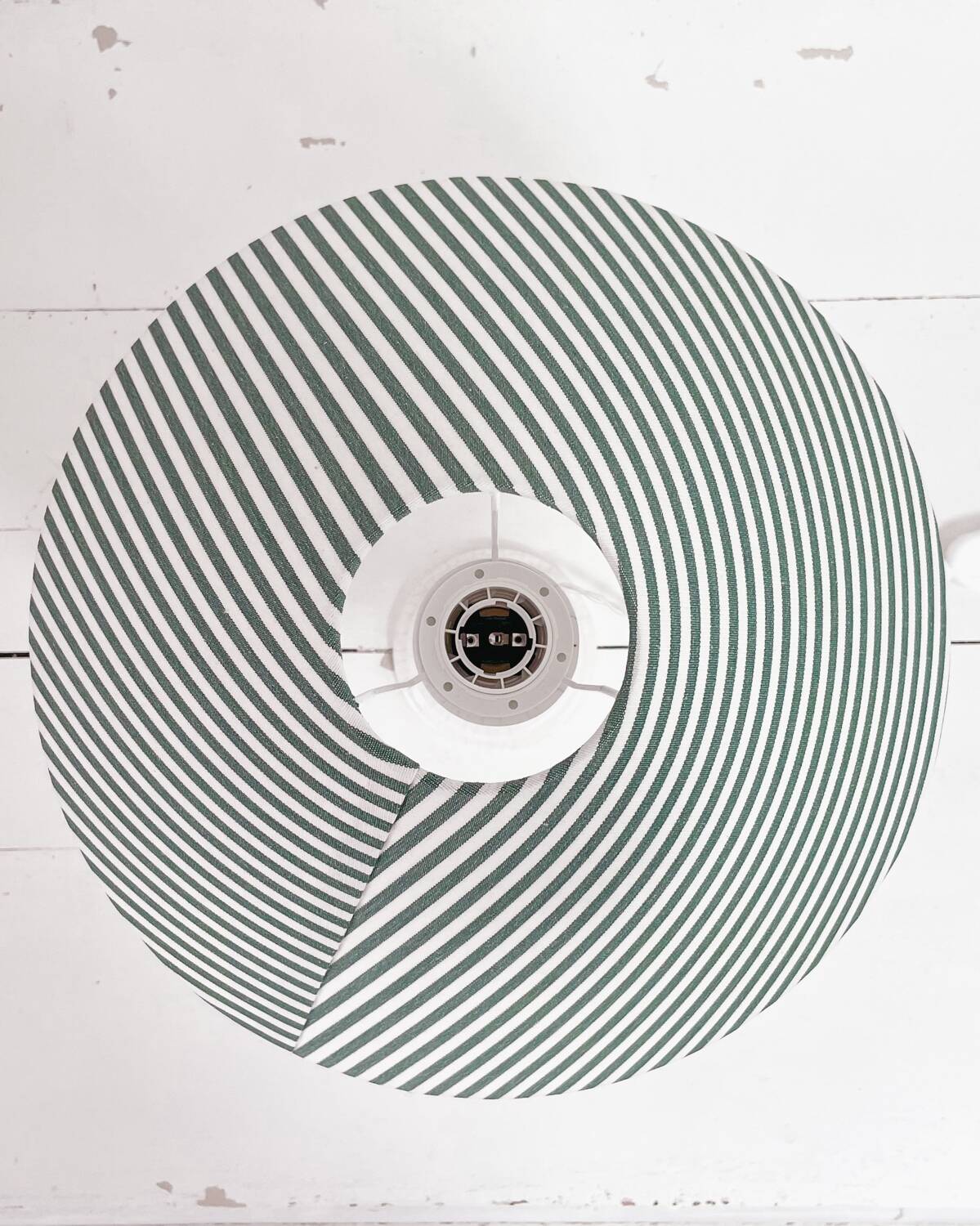 Earthenware lamp and striped lampshade