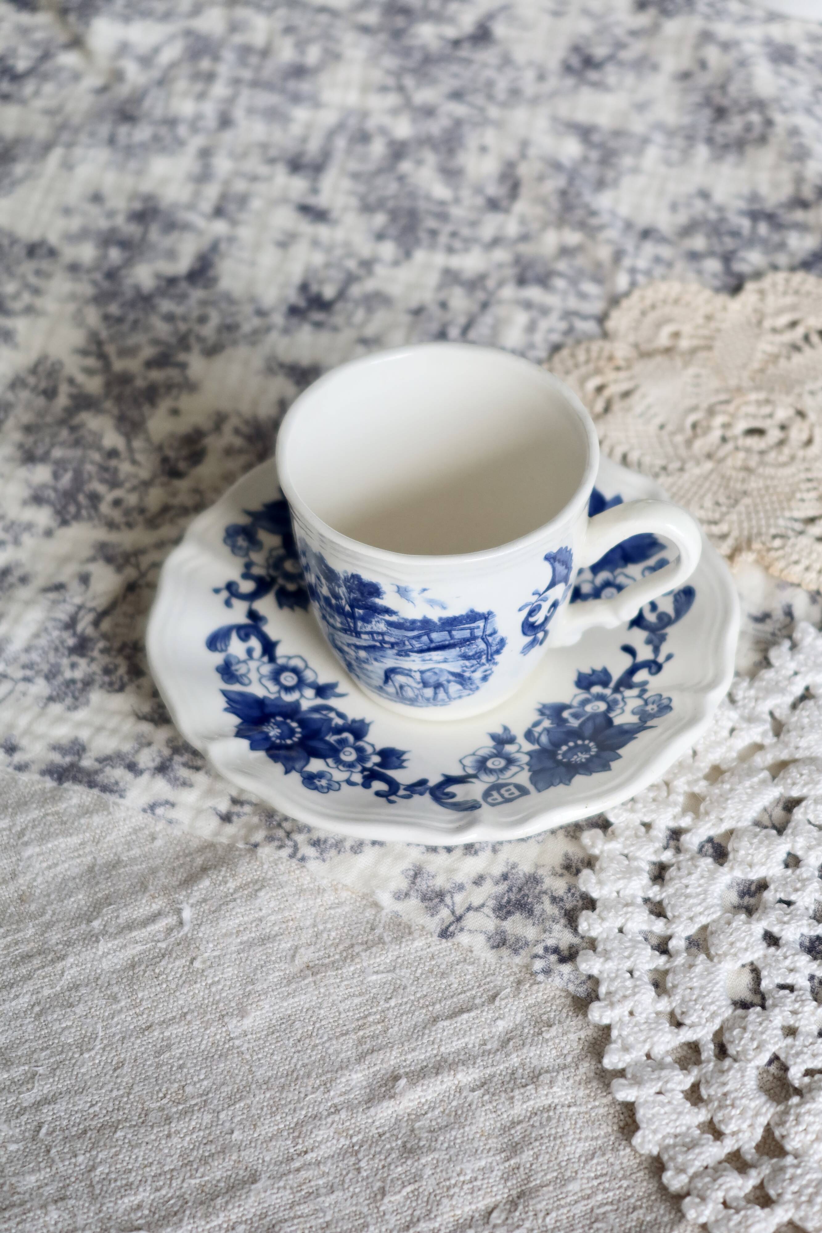 Vintage Sarreguemines cup & saucer – White earthenware with blue floral decoration