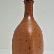 Soliflore vase in pyrite sandstone with three vintage faces
