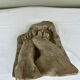 Stone sculpture, two feet on a block, signed D. Paillot.