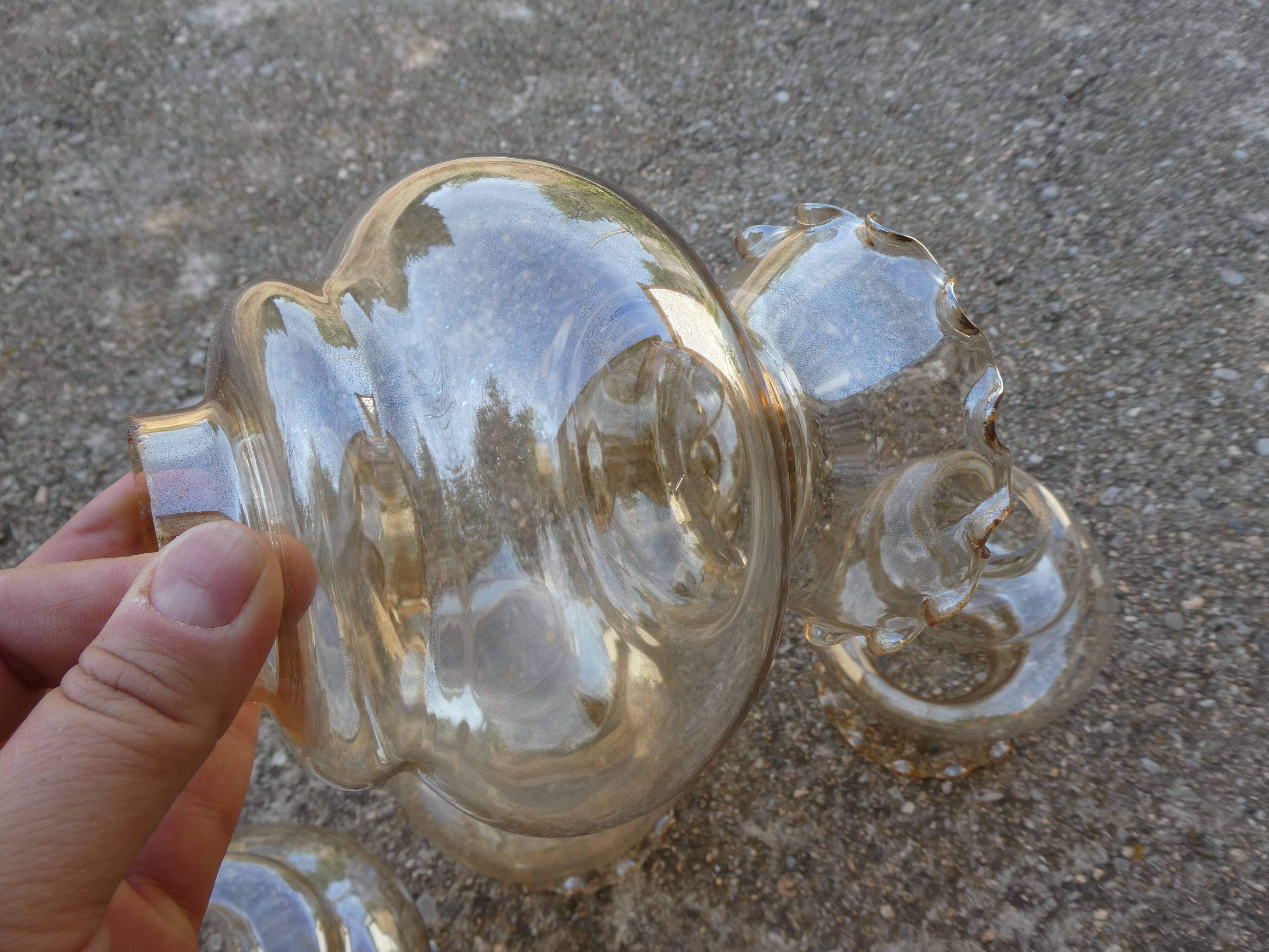 Set of 6 amber glass globes.