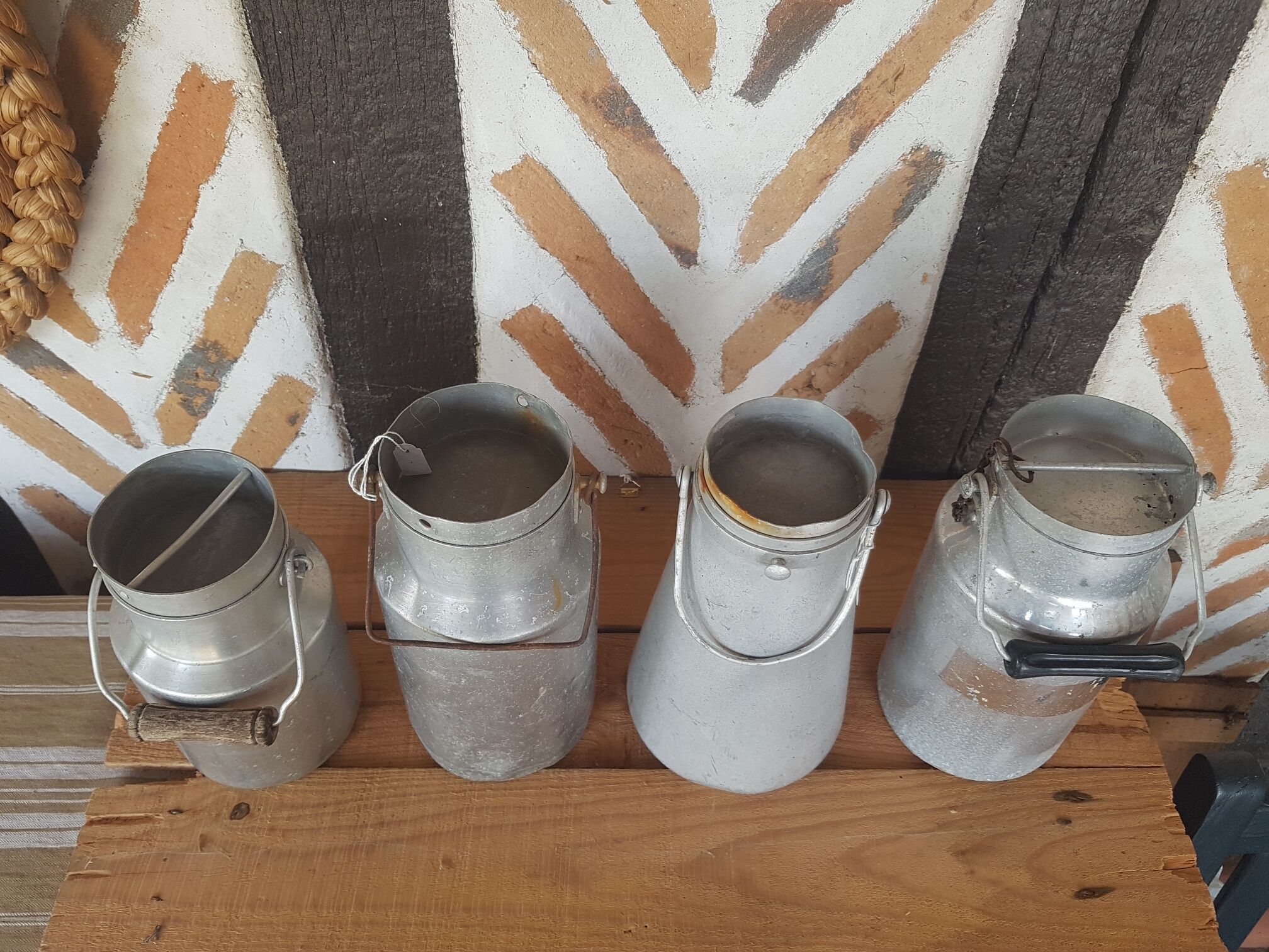 Set of 4 old metal milk canister jars