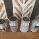 Set of 4 old metal milk canister jars