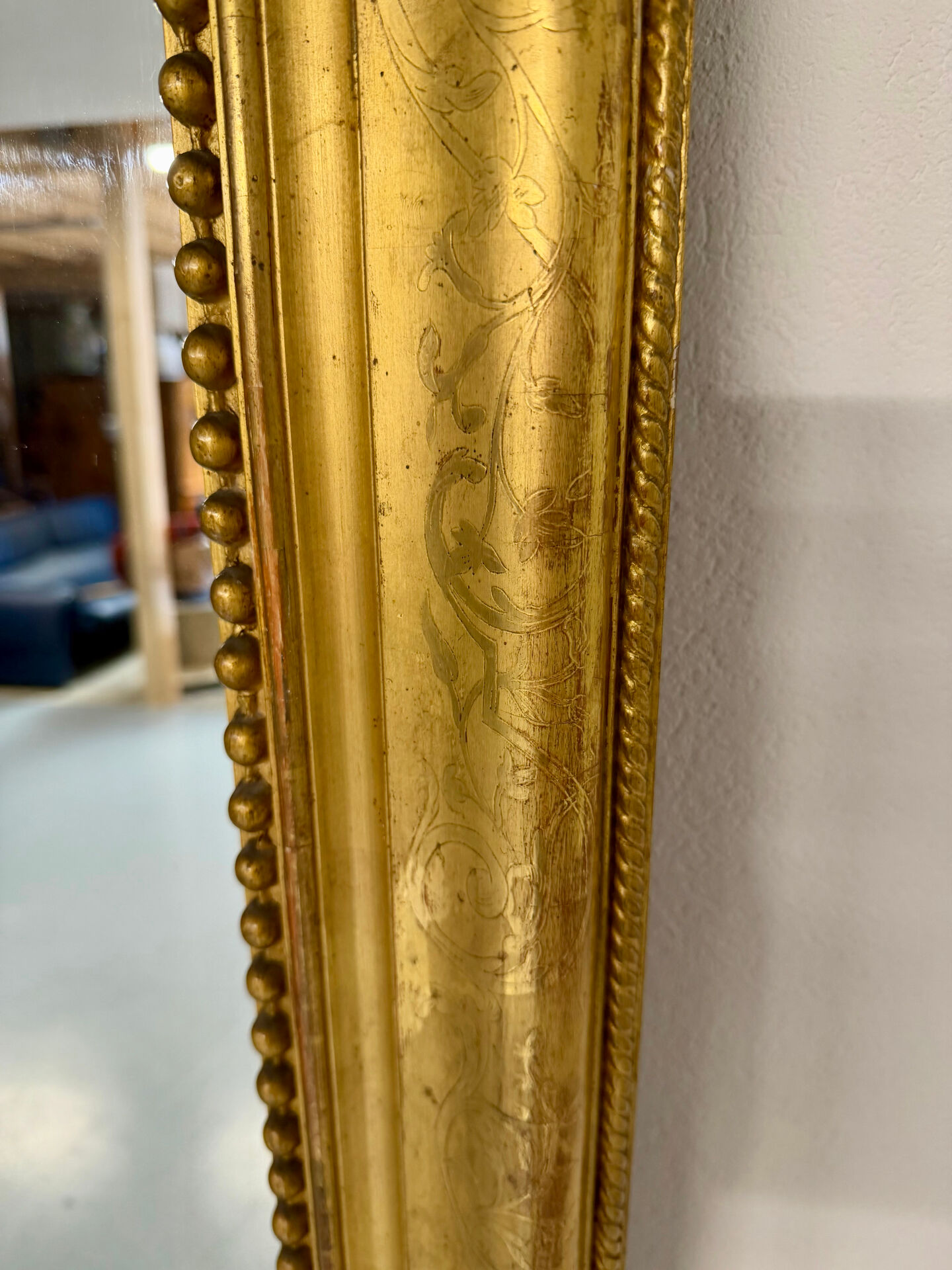 Large Napoleon III mirror with wooden gilded frame, 19th century, 200 cm.