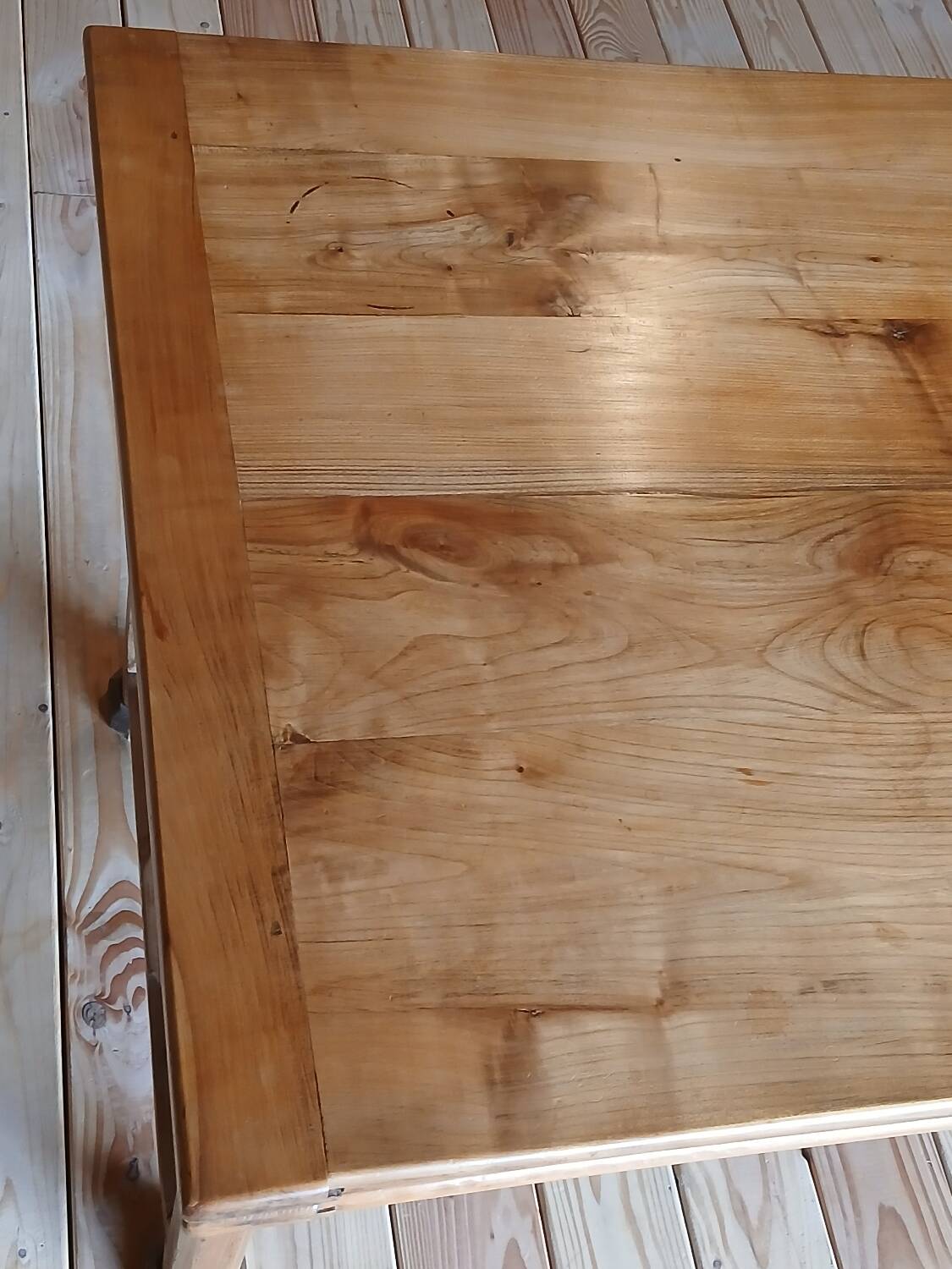 Elm farmhouse table with extensions for 6 to 10 people.