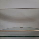 Armoire à barre vintage en forme de cylindre ouvrable, bois, laiton et verre.