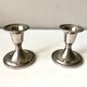 Pair of silver metal candle holders
