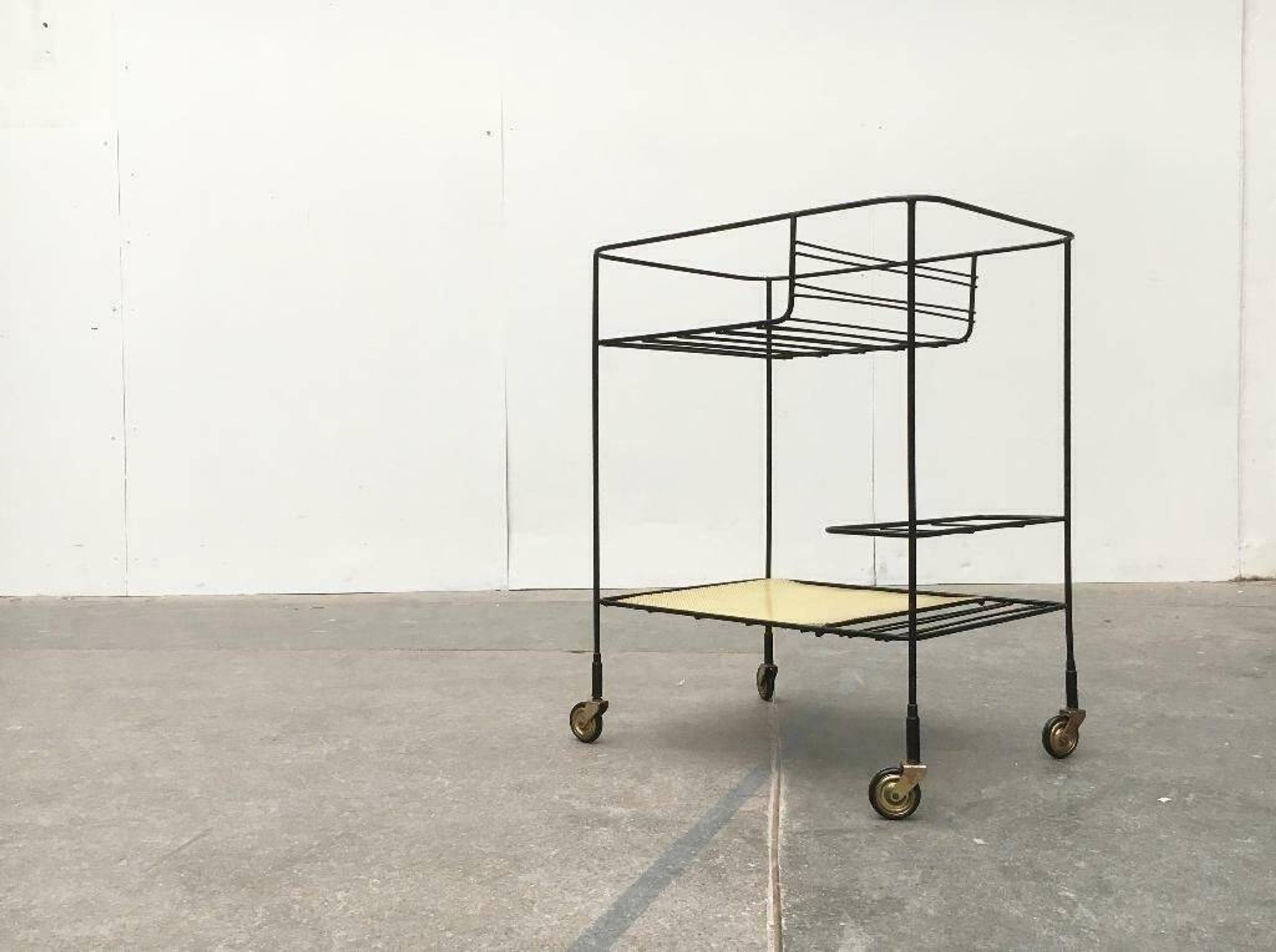 Minimalist perforated metal serving trolley in mid-century style, 1960s.