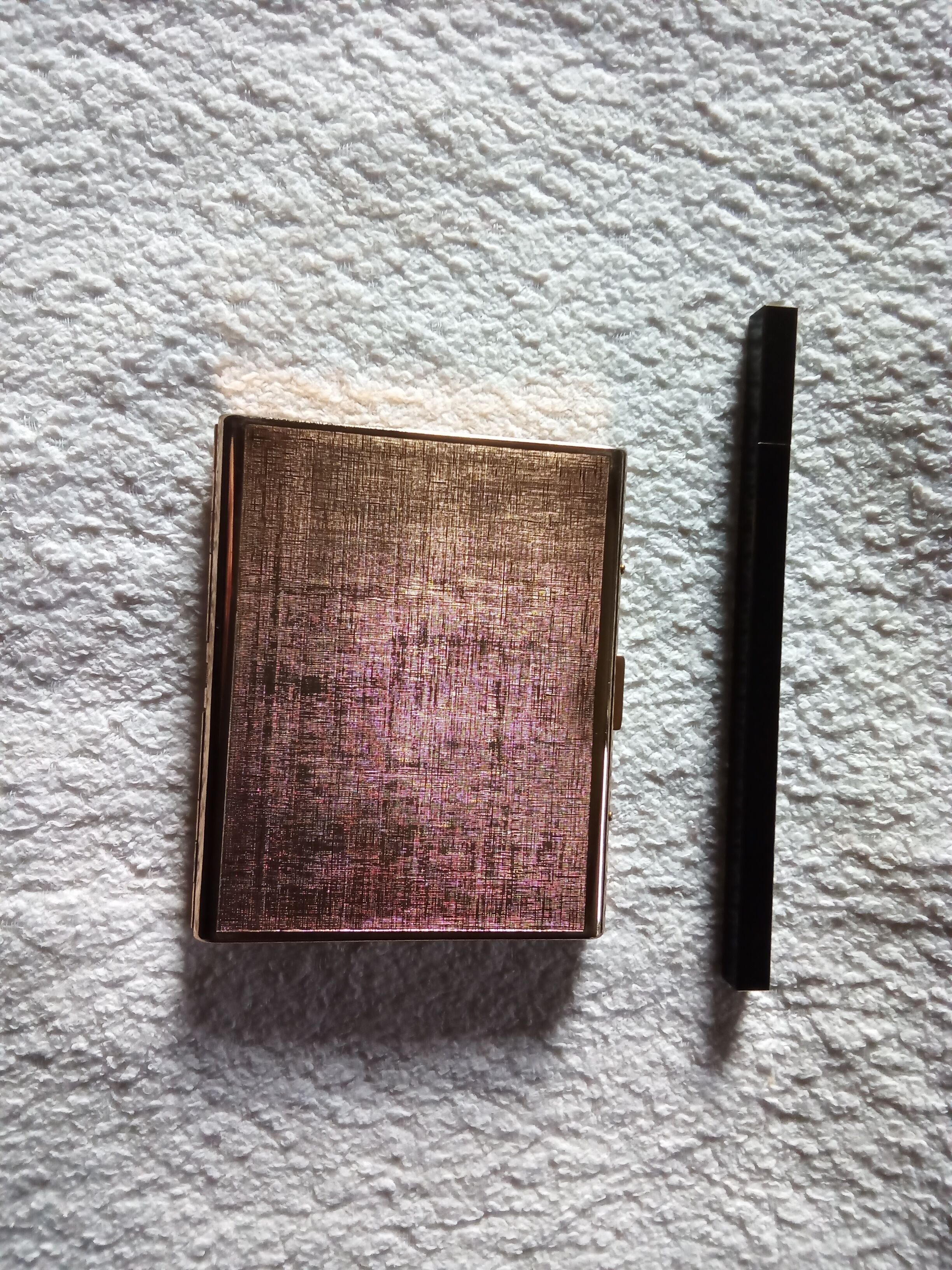 Cigarette case and vintage lighter