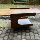 Rolling teak coffee table with foldable top circa 1960