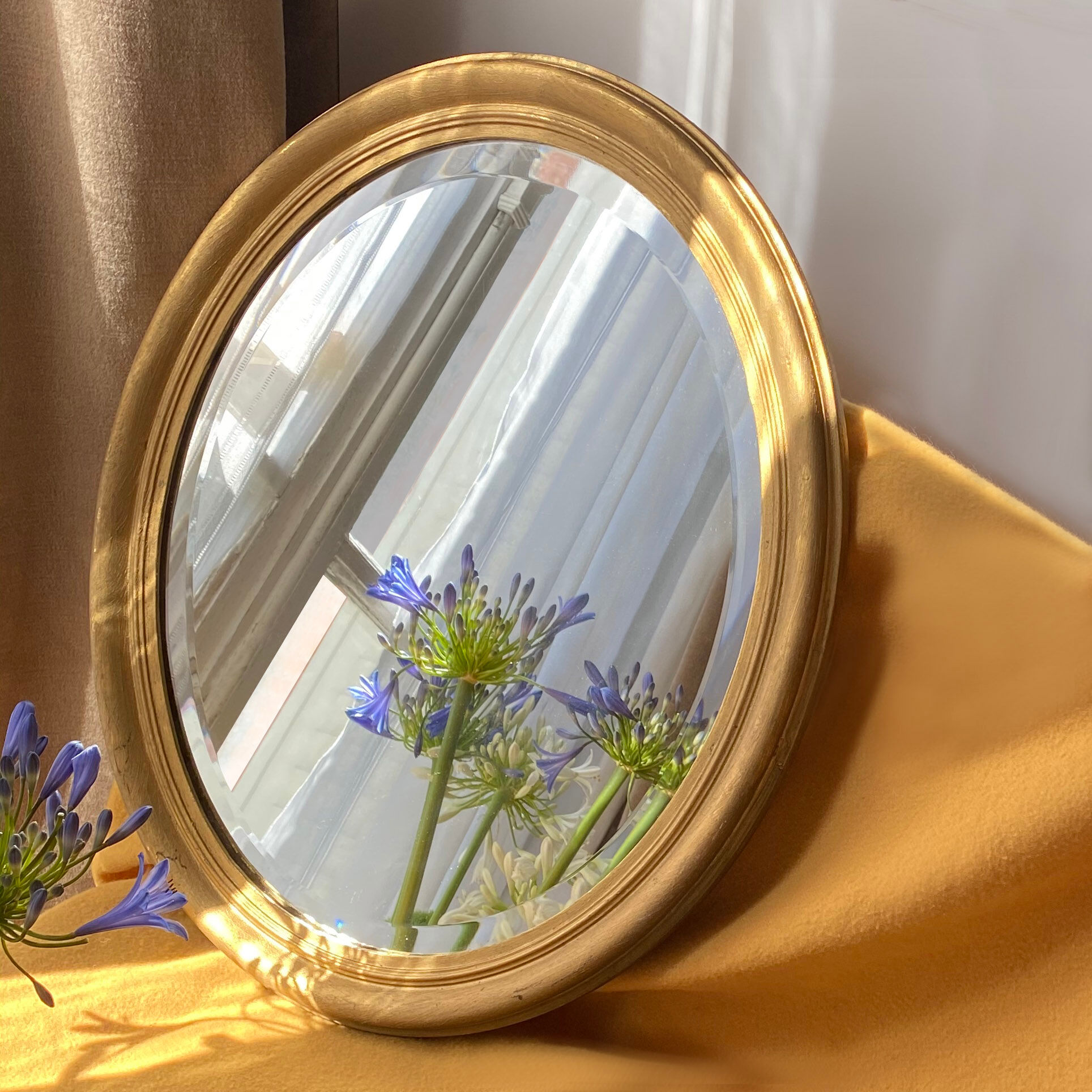 20th century golden oval mirror