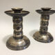 Pair of silver metal candle holders