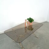 Smoked glass coffee table with gold-coloured legs from Sweden