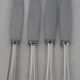 Christofle America, Art Deco, 4 silver-plated table knives, excellent condition.