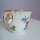 Lot de 6 tasses à café et sous-tasses décor fleuri et liseré doré, porcelaine de Limoges Bernardaud