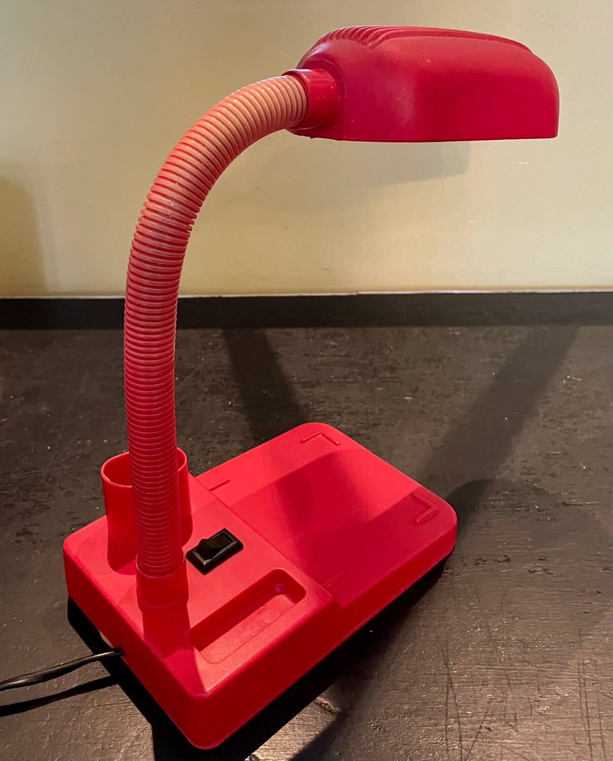 Vintage red articulated desk lamp