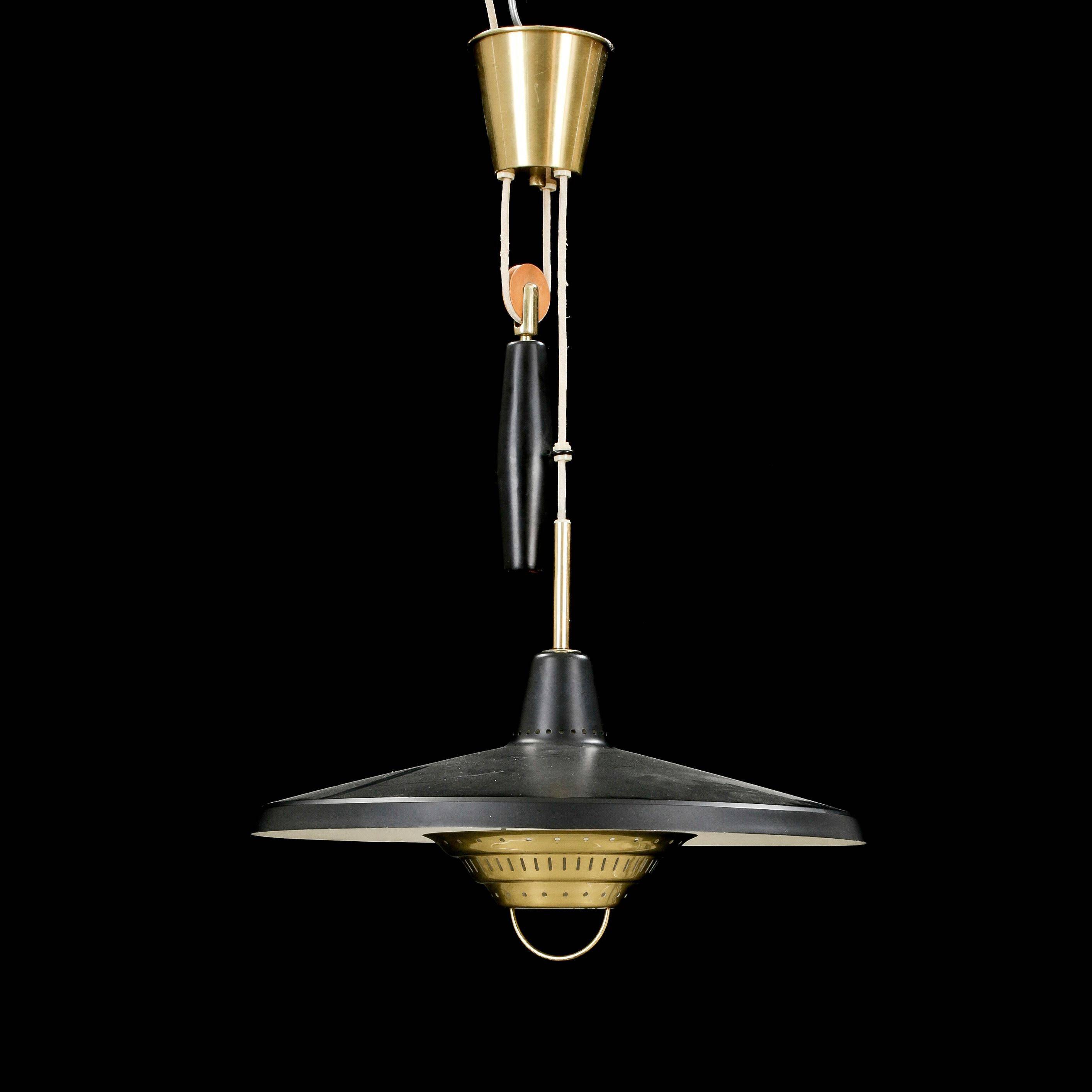 Anonymous suspended lamp with metal black and brass counterweight, Sweden, 1950.