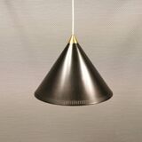 Cone pendant produced by Danish Lyfa in beautiful black lacquer with perforated shade and brass top.