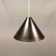 Cone pendant produced by Danish Lyfa in beautiful black lacquer with perforated shade and brass top.
