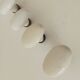 Set of 5 antique door handles in porcelain and brass.