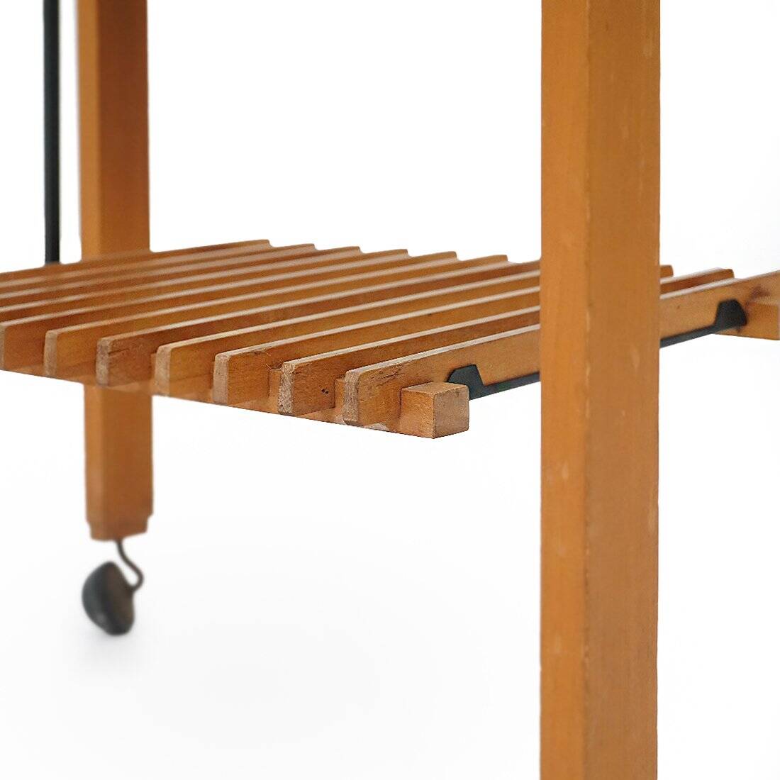 Wood and glass coffee table with wheels, 1960s.