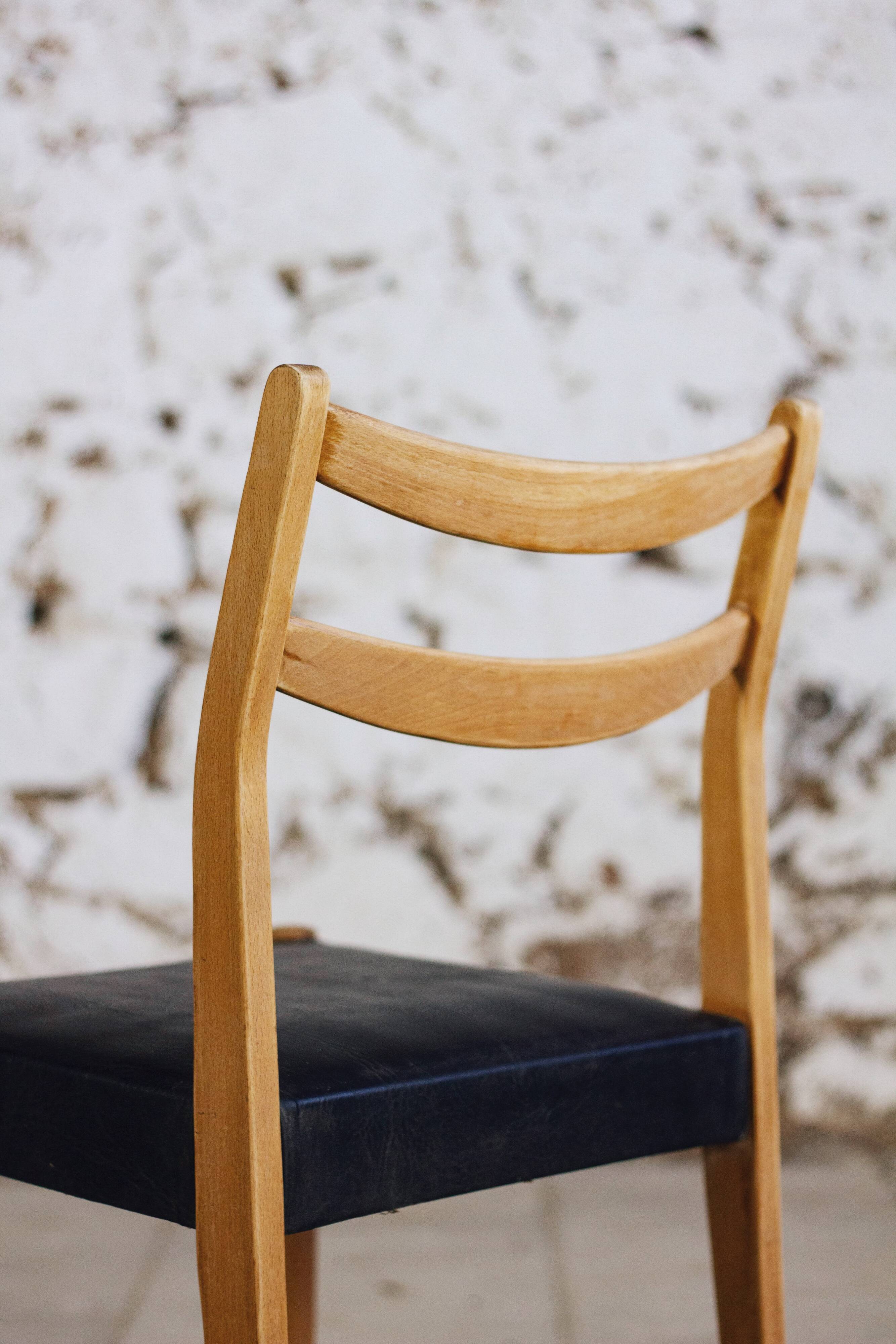 Scandinavian chair in teak and faux leather, 1960.