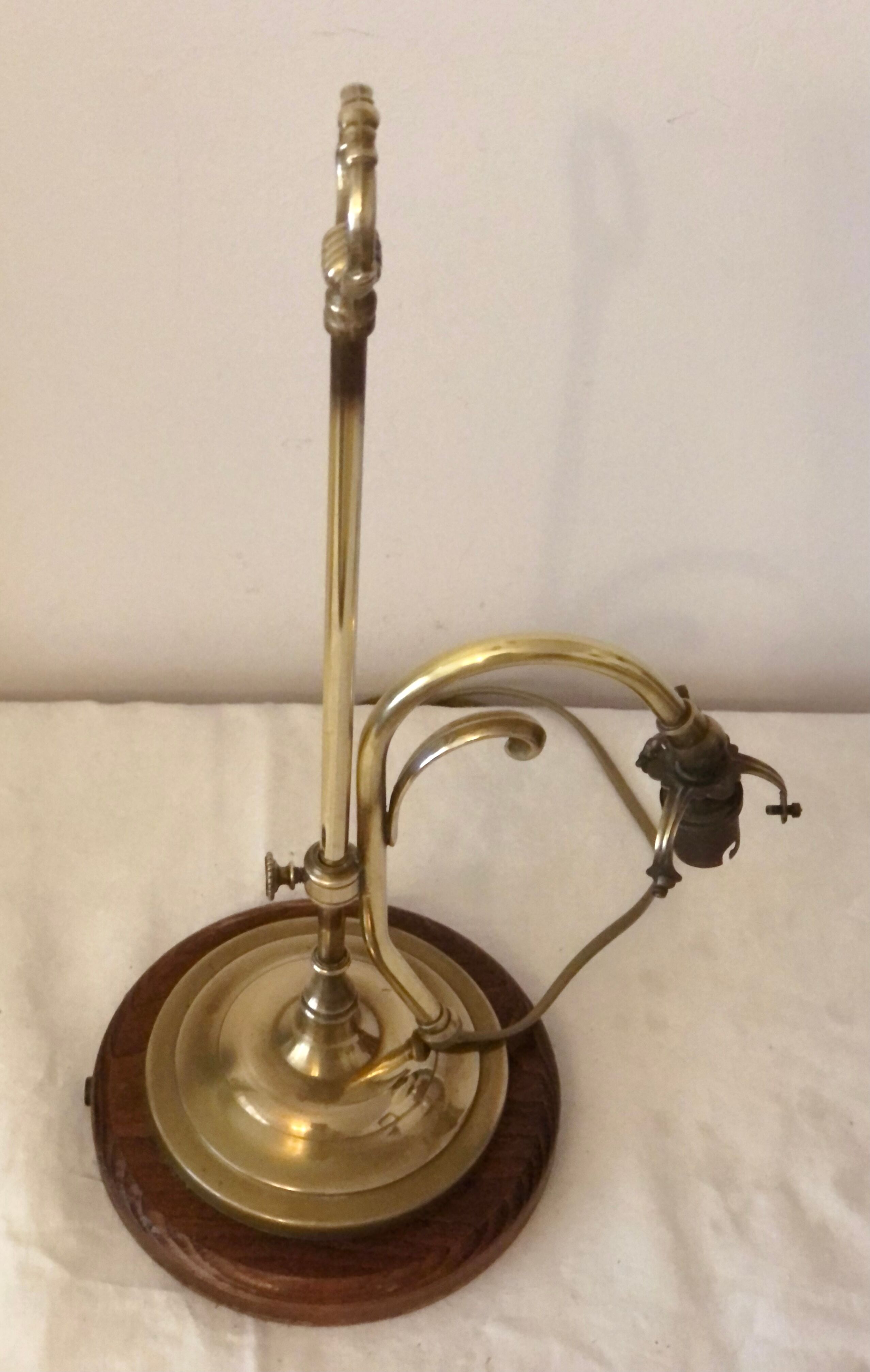 Old lamp adjustable on foot tulip golden brass.