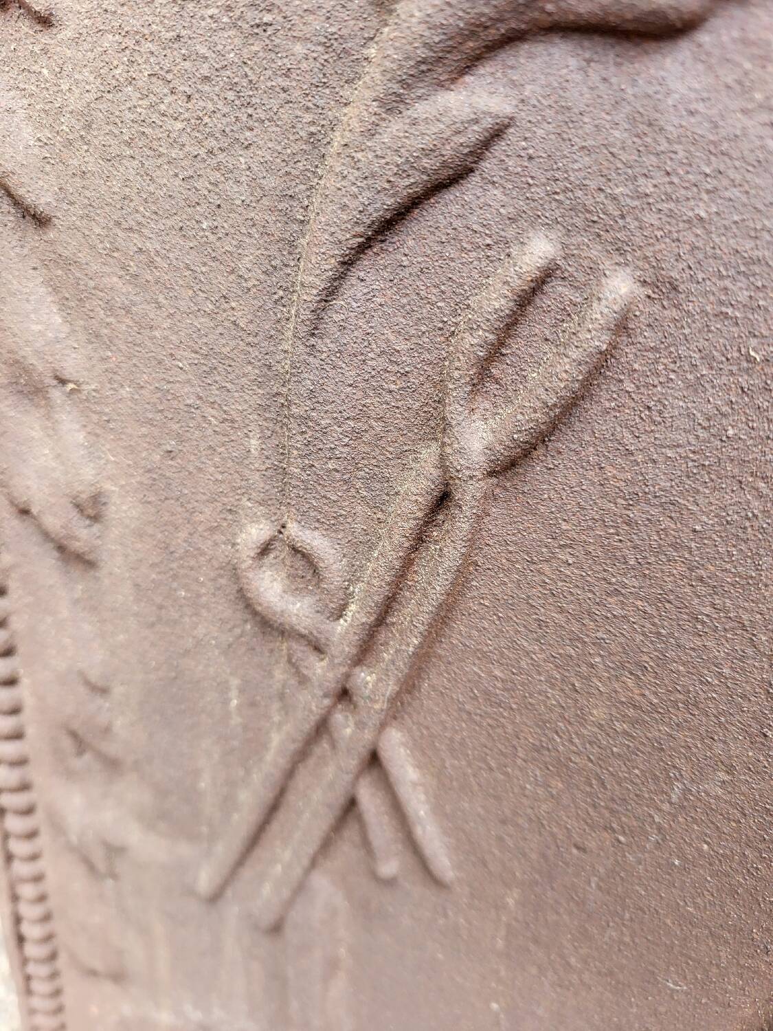 19th century cast iron fireback: bishop blessing the blacksmith's tools