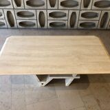 Rectangle travertine table with geometric foot