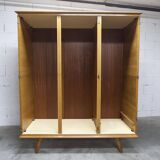 French wardrobe with tapered legs, 3 doors, 1 mirror (27*130), and 1 drawer.